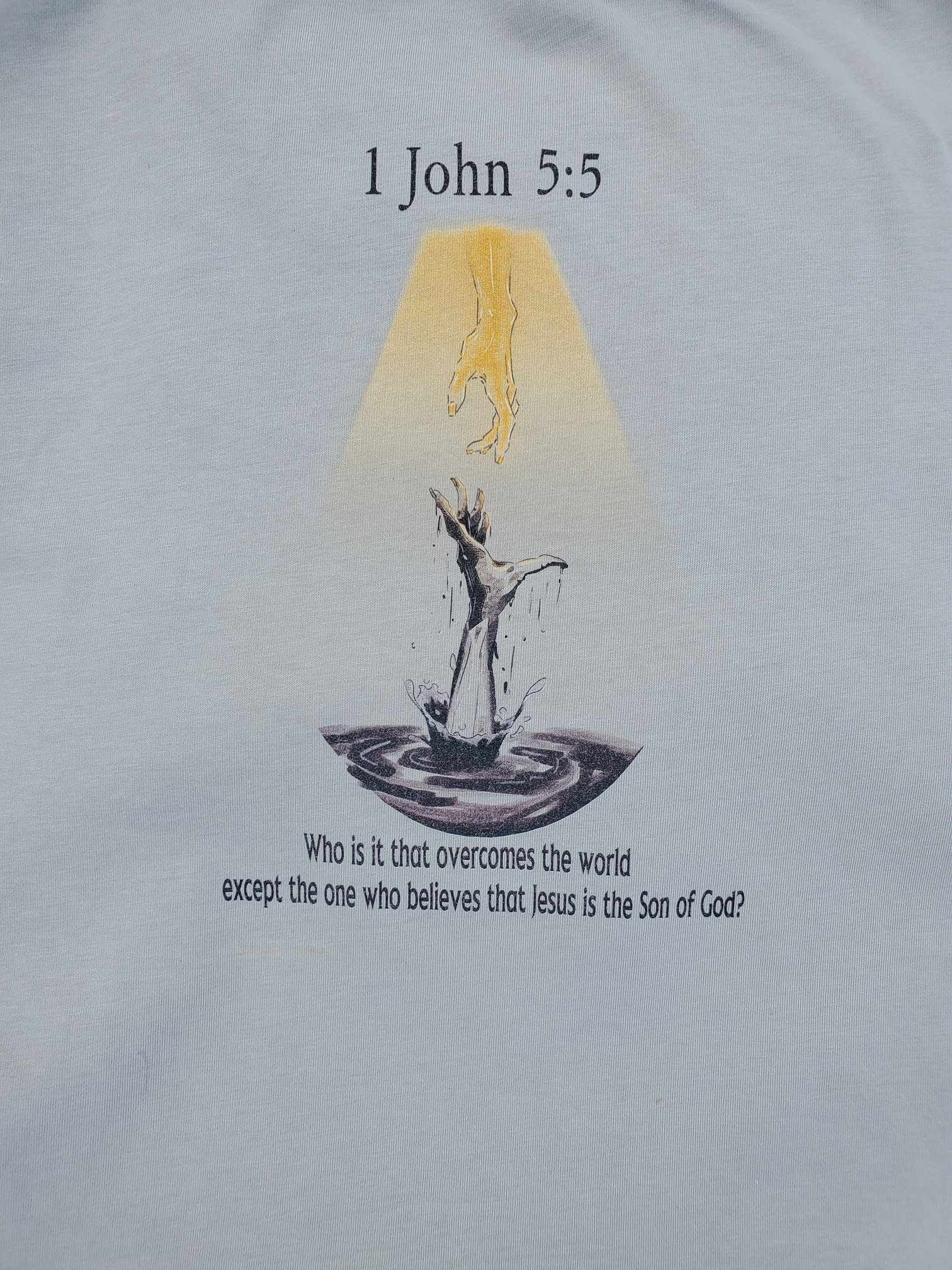 1 John 5:5 shirt backside closeup